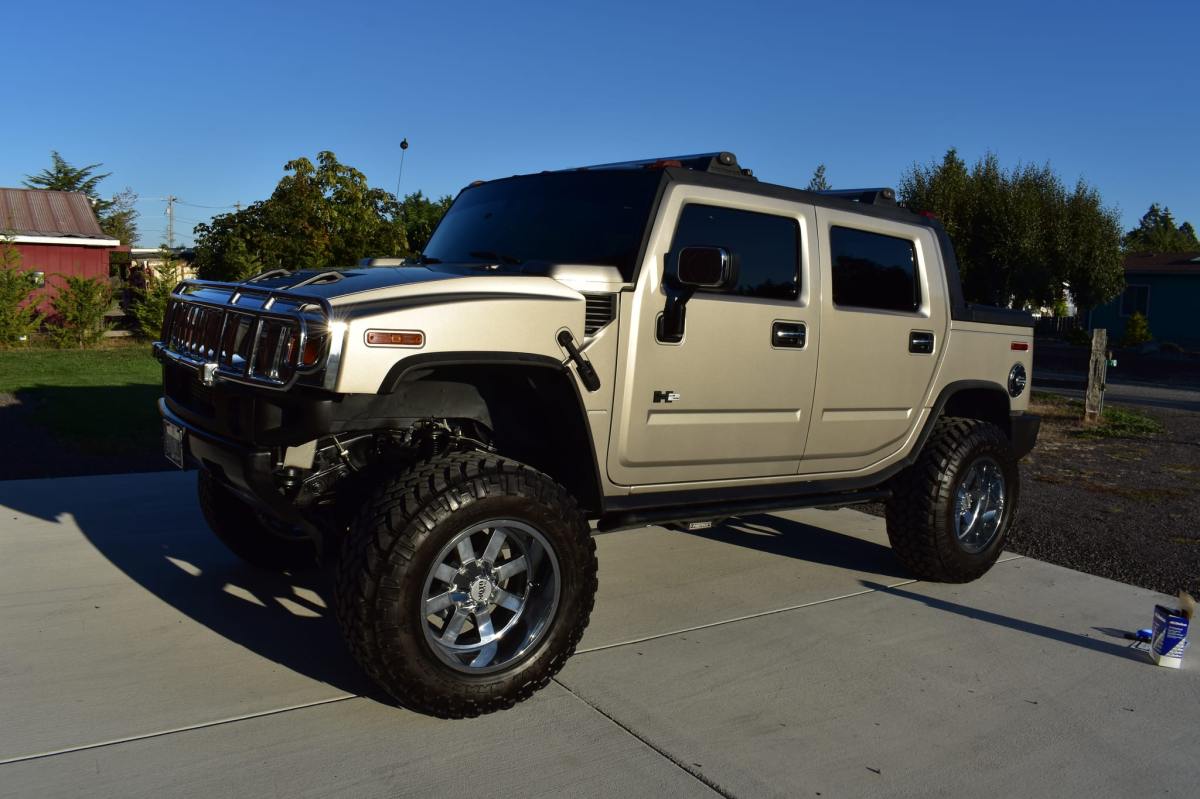 22k-Mile 2005 Hummer H2 SUT — exterior front three-quarter view