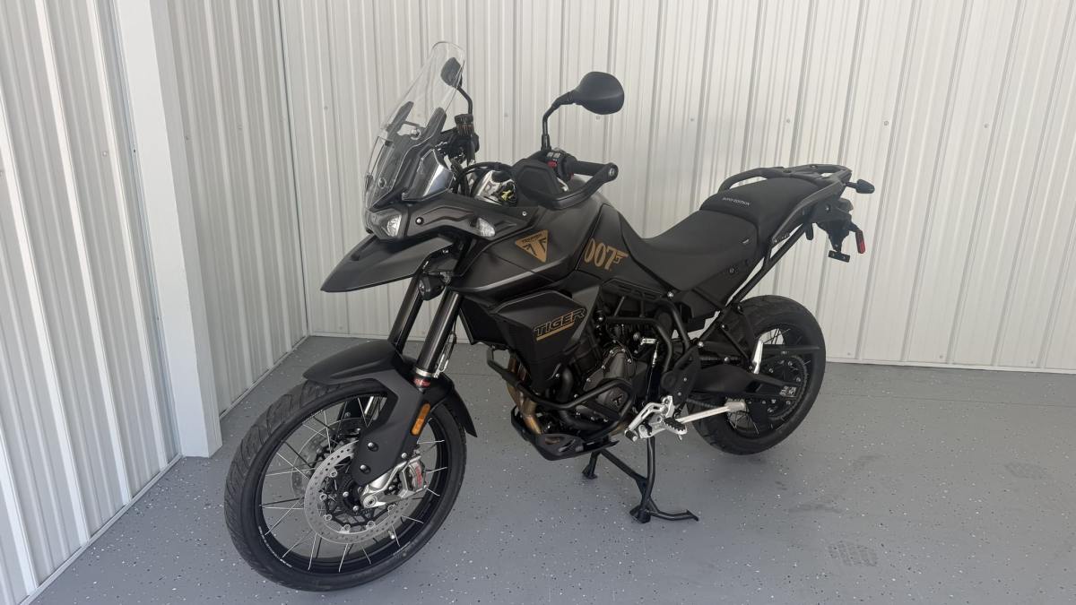 6-Mile 2023 Triumph Tiger 900 Bond Edition — exterior front three-quarter view